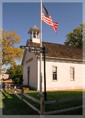 1889 Territorial School and flag pole